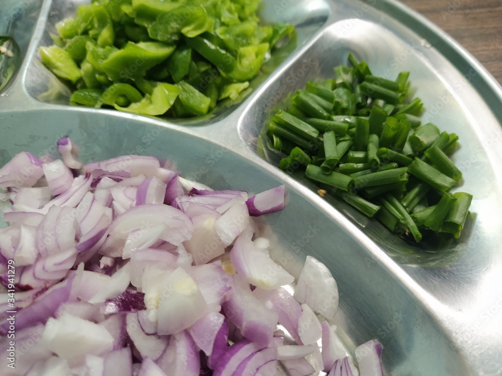 Fine chopped slices of the spring onion vegetable.