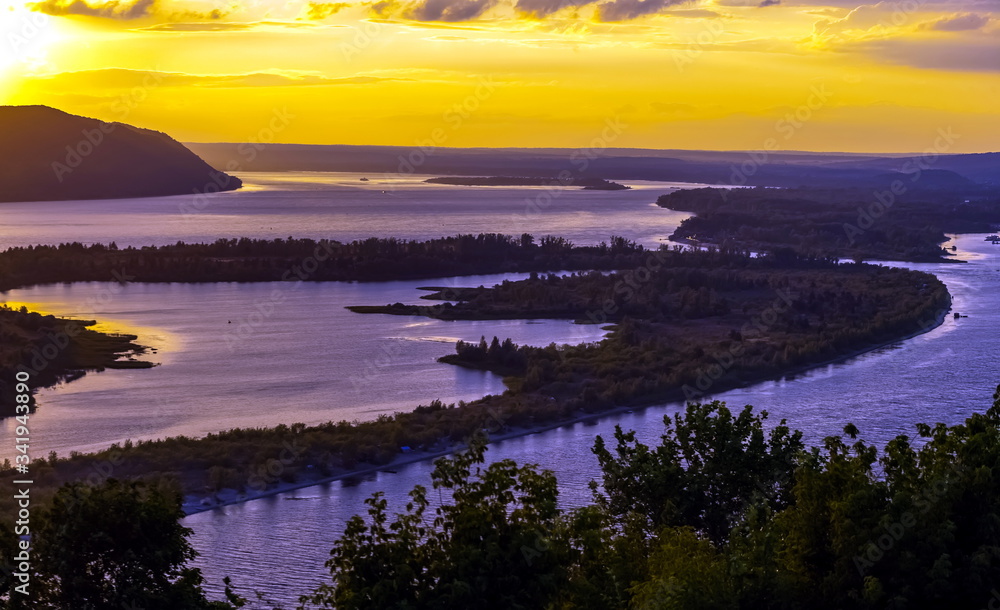 Landscape with sunset on the river in summer