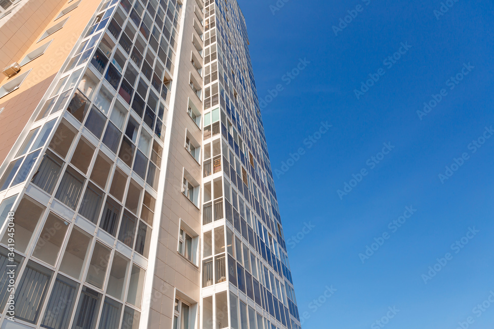 New tall house on a background of blue sky New tall house on a background of blue sky