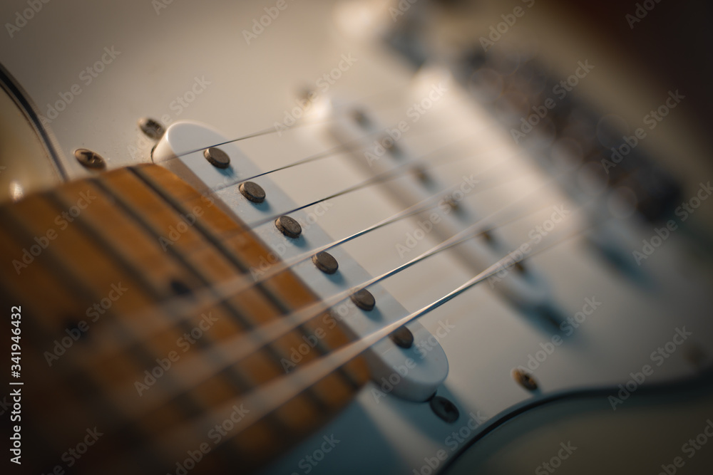 Fototapeta premium Electric guitar stratocaster closeup detail, macro abstract