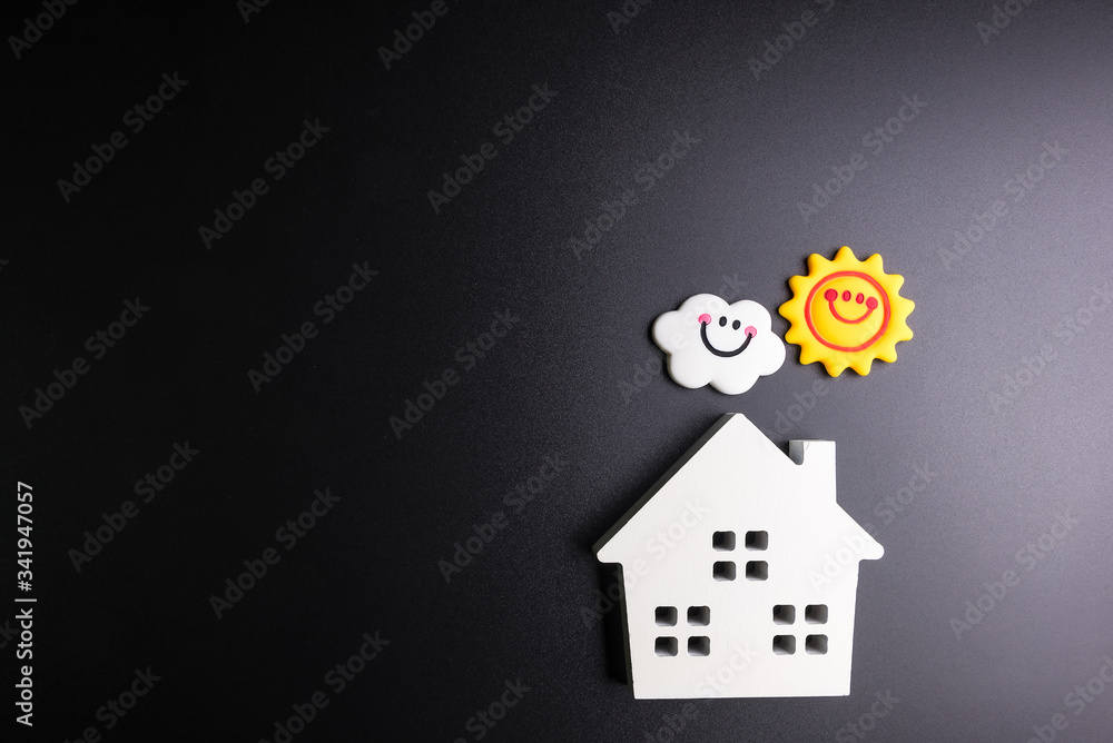 White model house with Clouds and bright sun on a black background