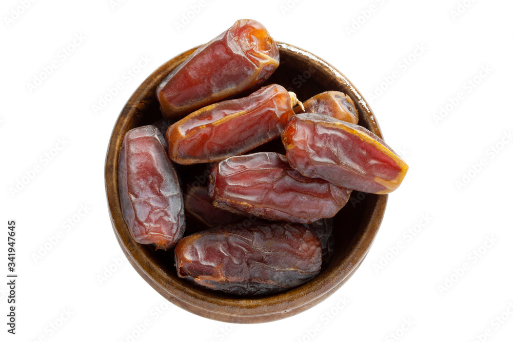 Dried date fruit in the plate Dried date fruit in the plate