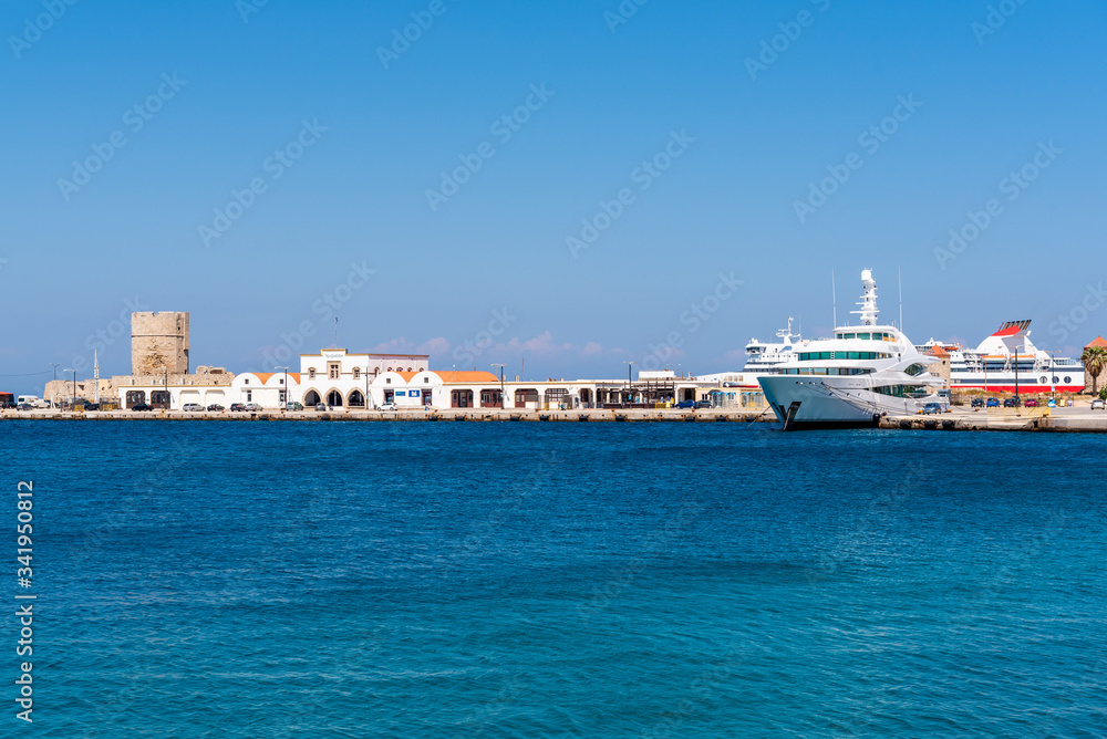 View of sea bay and Mandraki harbor in Rhodes island, Greece