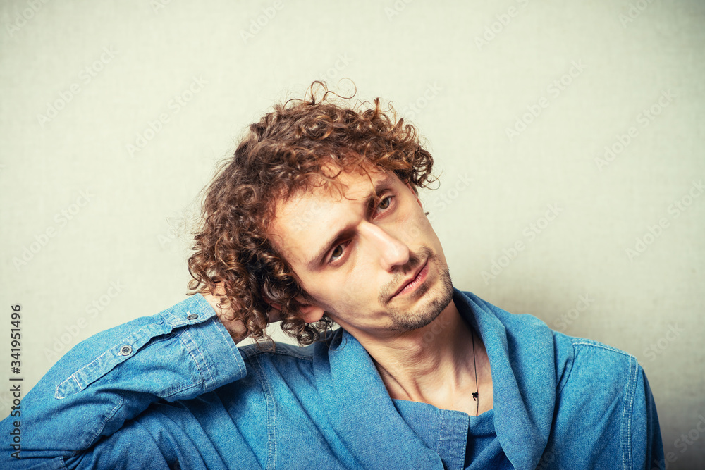 Fototapeta premium Man holding his hands behind his head