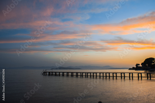 Fototapeta Naklejka Na Ścianę i Meble -  pier in the sea during sunset