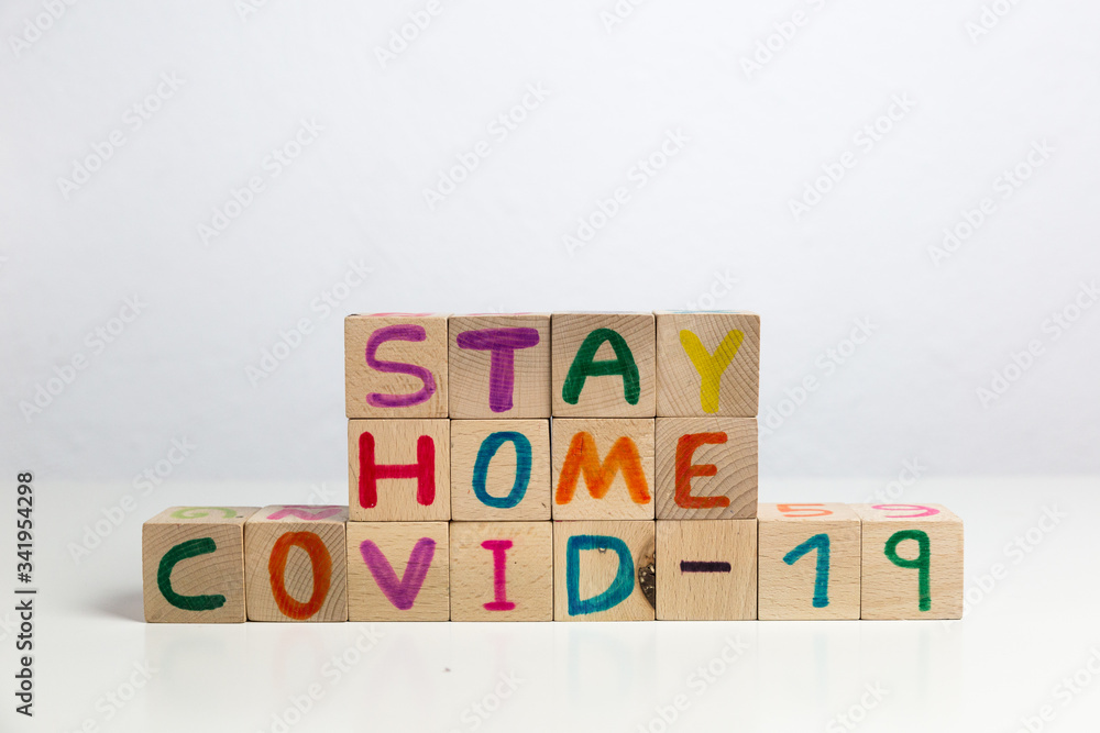 the word education on a wooden background. Stay home. the word education on a wooden background. Stay home.