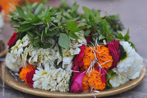 Puja flower offering prepared for the sunset ceremony. photo