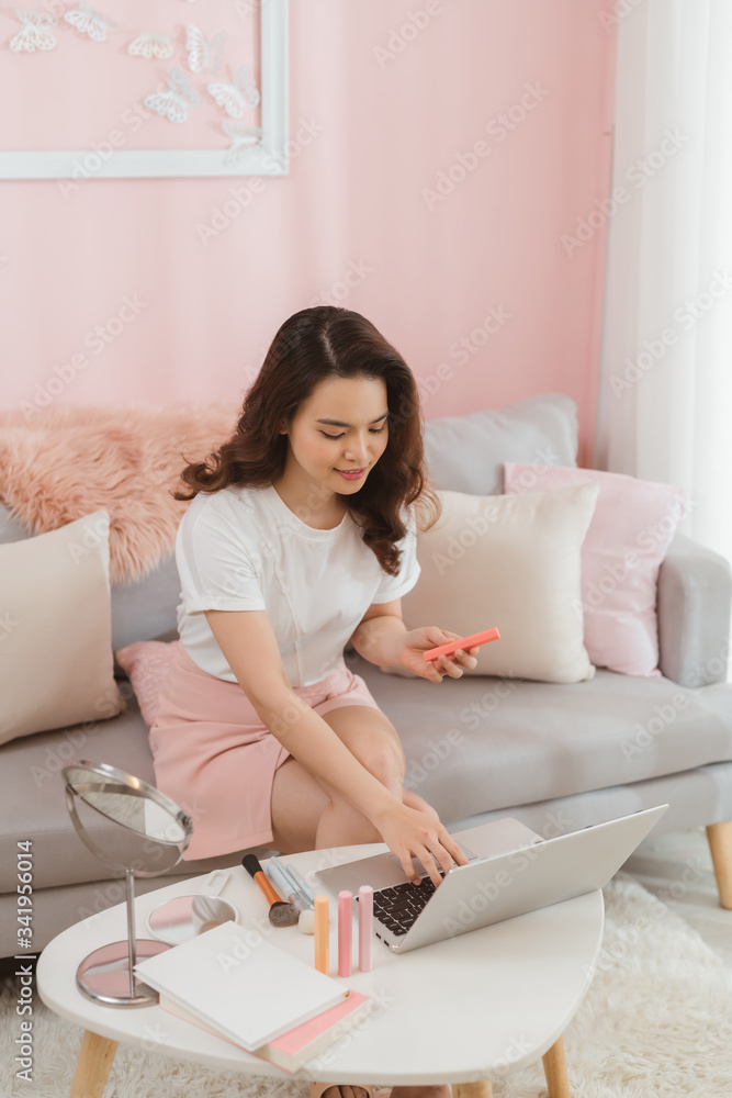 Startup small business owner working with computer at workplace. Freelance woman seller check product order. Startup small business owner working with computer at workplace. Freelance woman seller check product order.