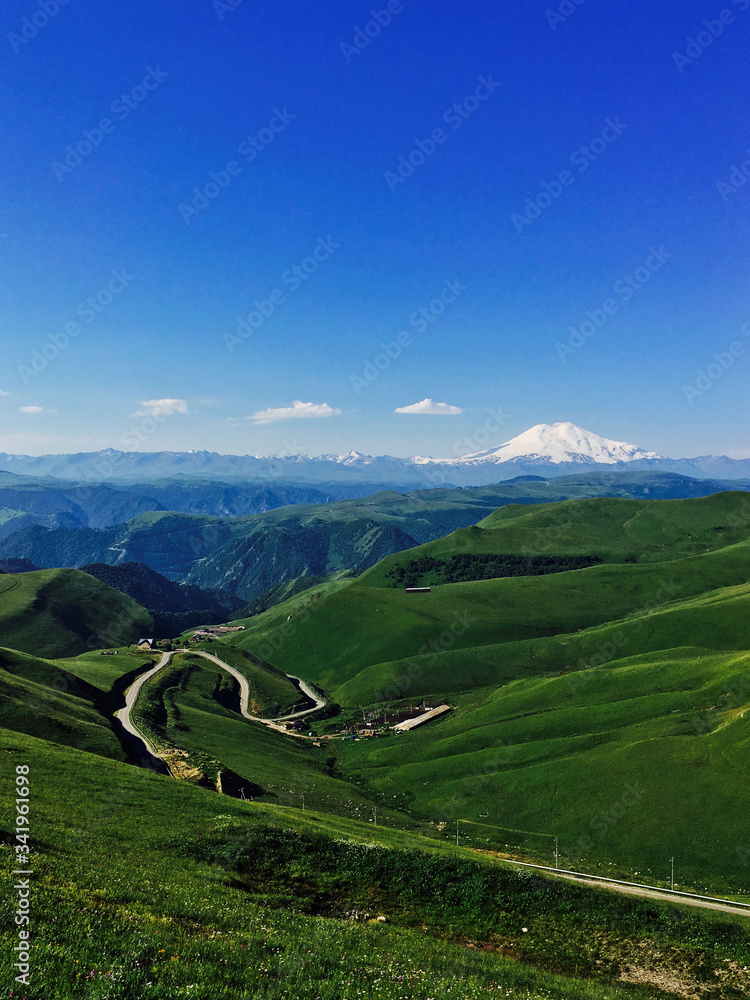 Fototapeta premium Elbrus volcano in summer from the Bermamyt plateau Russia