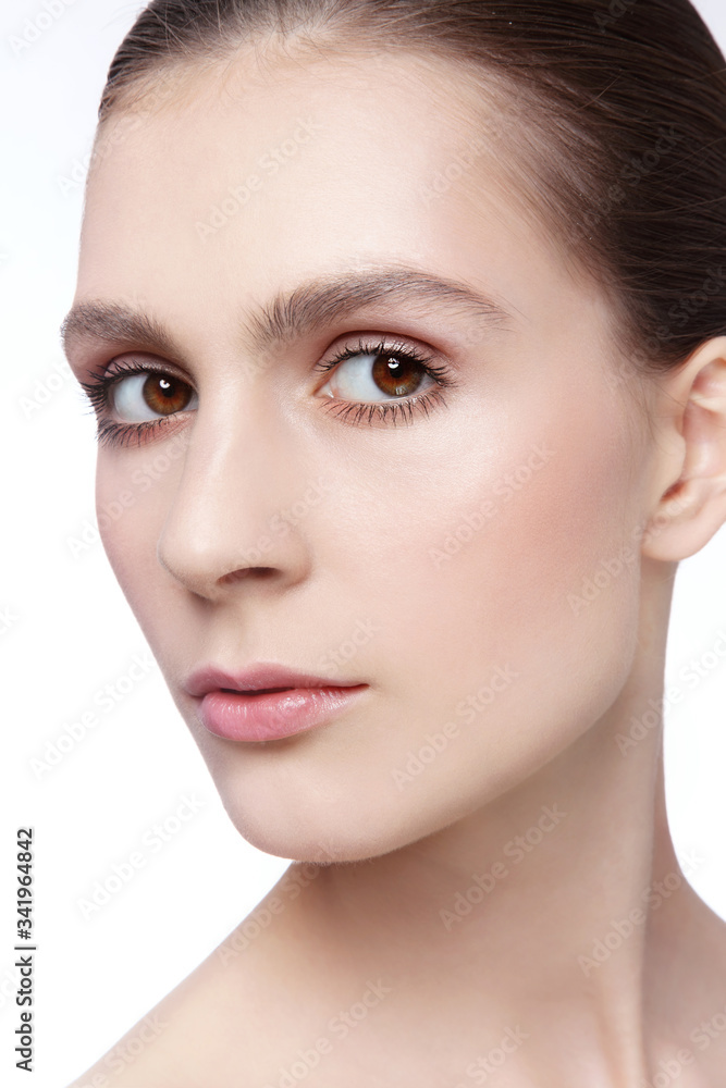 Close-up portrait of young beautiful woman with healthy radiant skin Close-up portrait of young beautiful woman with healthy radiant skin