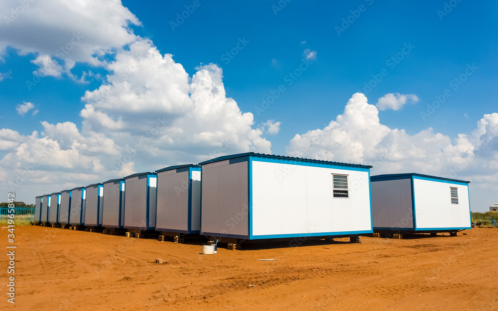 Relocatable portable buildings used as prefabricated offices on building sites and other amenities - obrazy, fototapety, plakaty 