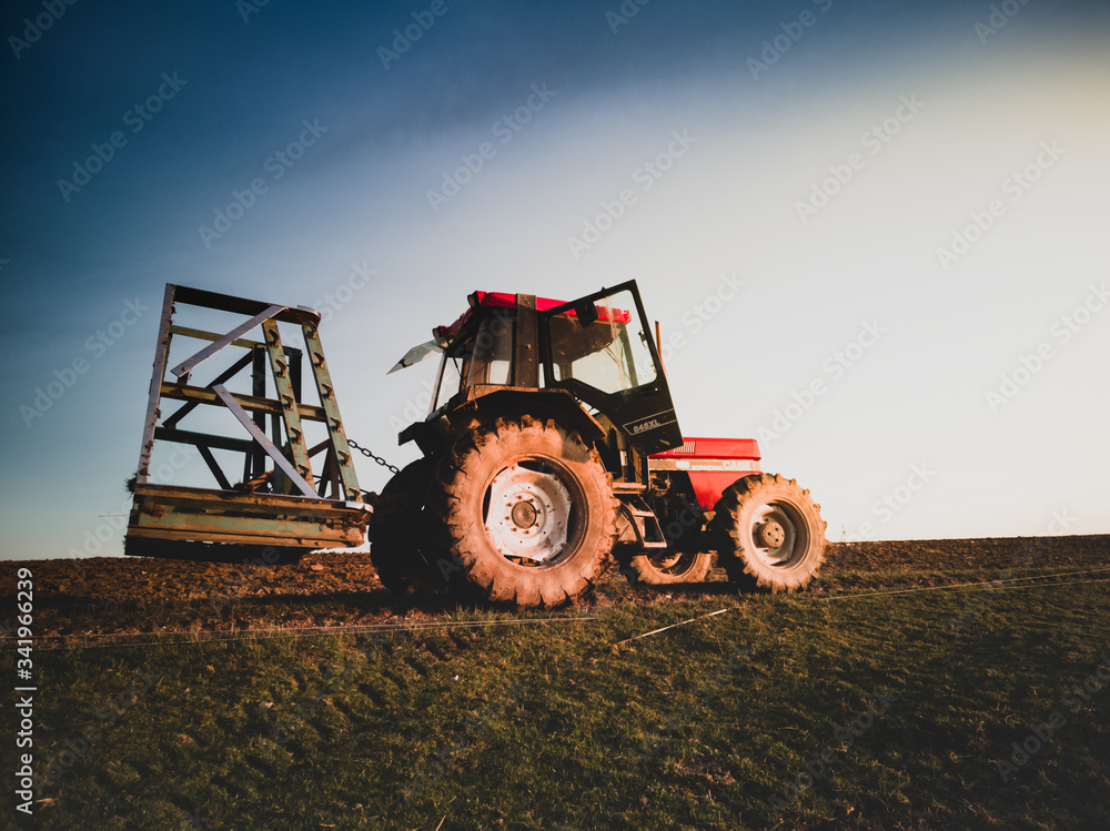 Fototapeta premium tractor in the field