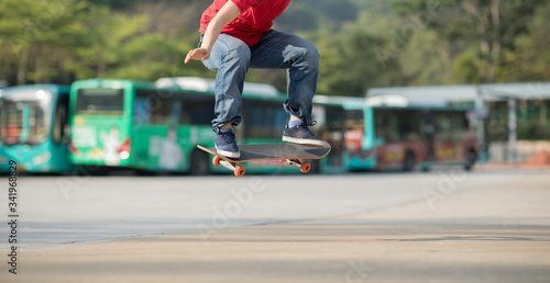 Skateboarder legs skateboarding at outdoors