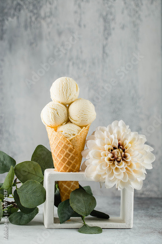 Summer vanilla ice cream. Flowers decoration