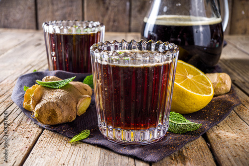 Indian summer refreshment beverage, Panakam Or Gur (Jaggery) Sharbat, Panakaam drink, Traditional sarbats, infusions of fruits, flowers, herbs, roots, rustic wooden background copy space photo