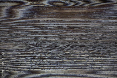 Dark wood texture with knots and horizontal fibers