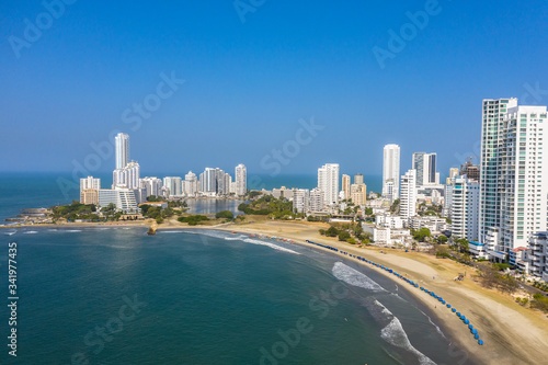 Resorts of South America. Aerial view of the Caribbean coast in a modern tourist area of the city. © ronedya