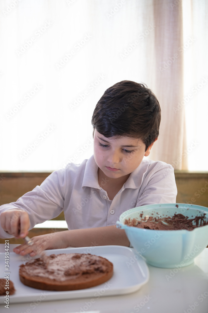 happy family funny kid preparing the cake happy family funny kid preparing the cake