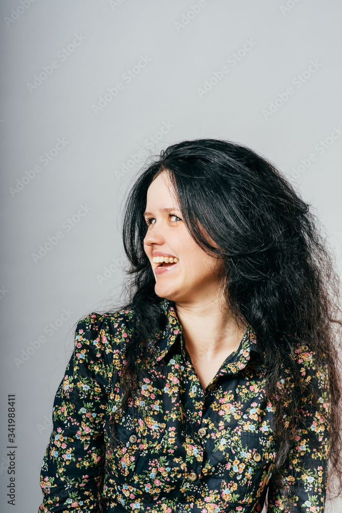 Profile face of beautiful laughing young woman Profile face of beautiful laughing young woman