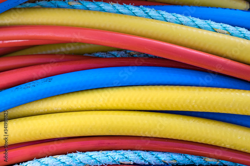 Multicolor electric industrial wires closeup, outdoors.