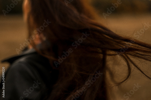Girl blowing her hair in the wind