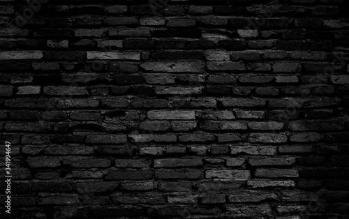 Old black brick wall texture background  black stone block wall texture  rough and grunge surface