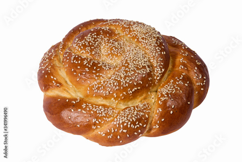 Sesame bun on a white background. Sweet pastries