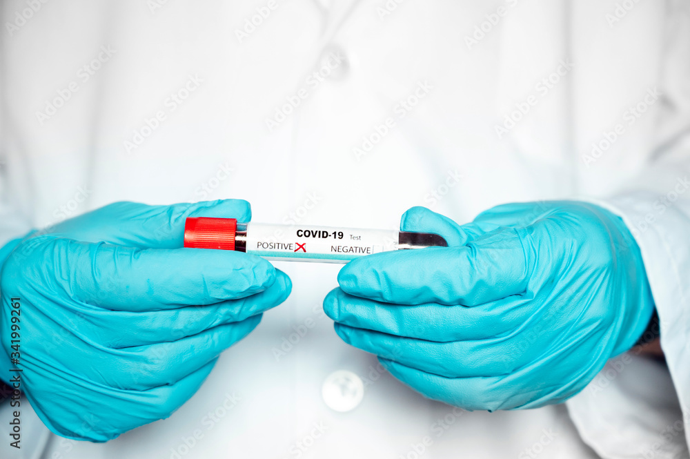 Nurse's hand taking a blood test of Covid-19 Nurse's hand taking a blood test of Covid-19