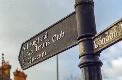 Signpost for Wimbledon's All England Lawn Tennis Club and Museum, the home of tennis  photo
