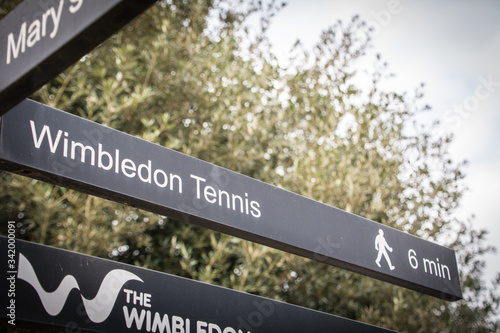 Wimbledon, London- Sign post for the Wimbledon Tennis grounds and walking route photo