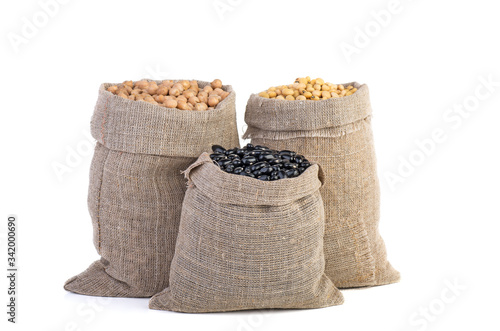 Jute sacks with dried peas, soja beans and black legume