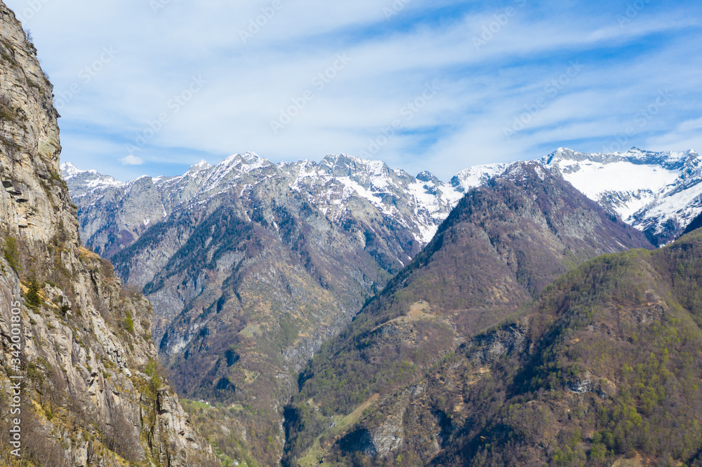 aerial mountain panorama in Ticino Lavizzara with snowcapped mountains
