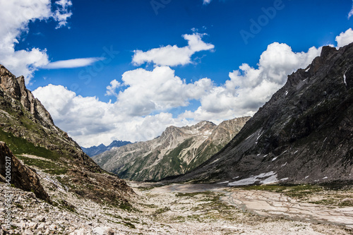 Alpine meadows and rocks in the Caucasus mountains in Russia © yuliagubina