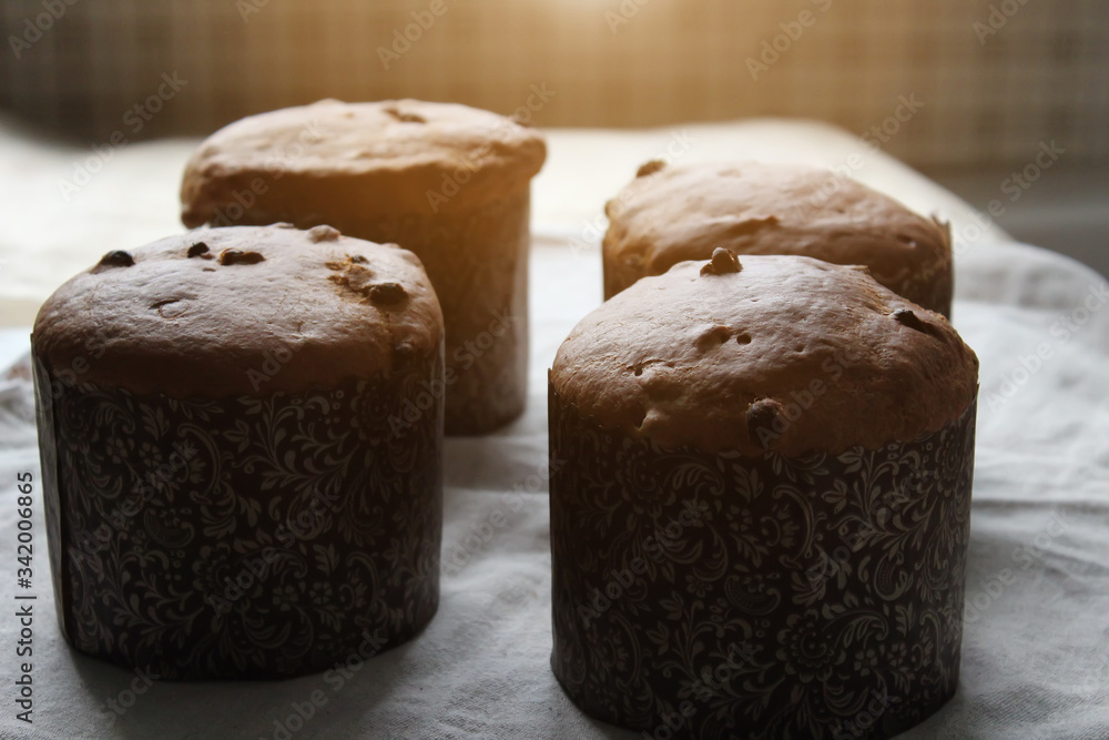 Raisin muffins on the table. Homemade cake. Concept of homework during the quarantine period. Raisin muffins on the table. Homemade cake. Concept of homework during the quarantine period.