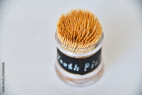 Close up of wooden toothpicks that placed on table