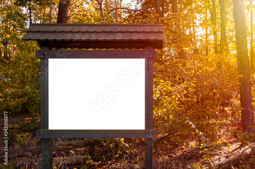 Canvas Print Blank white information board in the forest