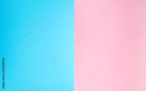 Pink and blue background. Paper material. Copy space.