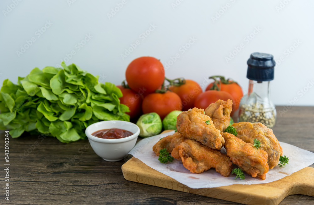 crispy kentucky fried chicken in a wooden table junk food and