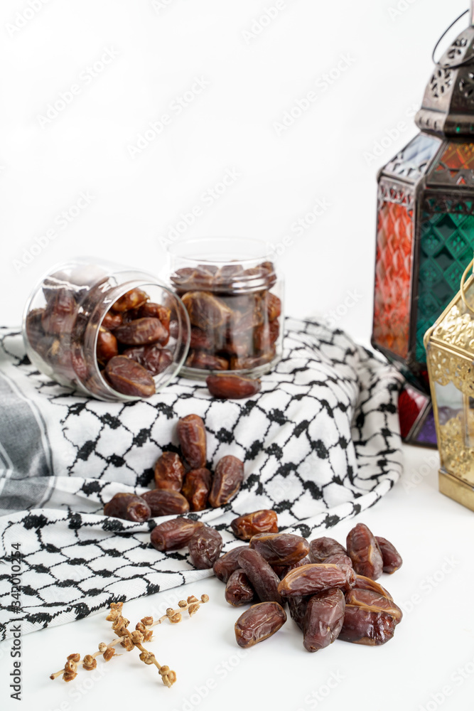 dates palm and arabic lantern on white. eid mubarak background
