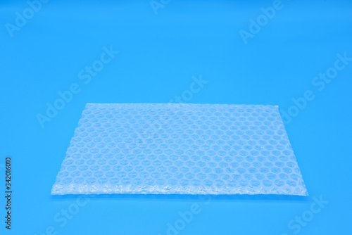 translucent air packaging, protection of goods, plastic packaging,Air bubble wrap foil texture,Air bubbles packaging bag photo