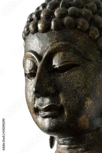 The face of the Buddha on a white scene © kiddeephoto