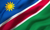 Flag of Namibia blowing in the wind. Full page Namibian flying flag. 3D illustration.