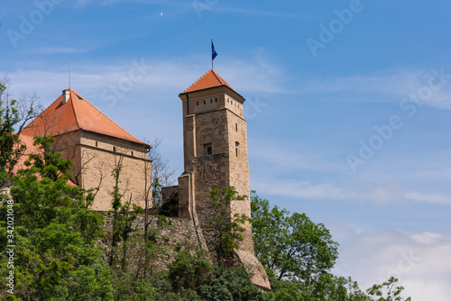 Veveri castle is located in the Czech Republic. Fortress walls and towers on the hill.