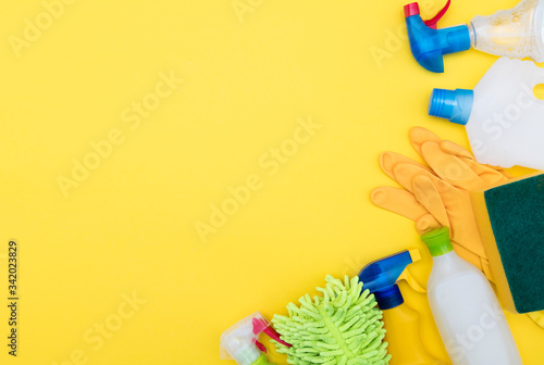 Cleaning spray bottles and cloth lay flat composition