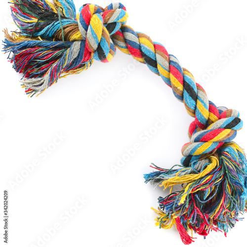 Dog toy - colorful cotton rope for games, isolated on white .