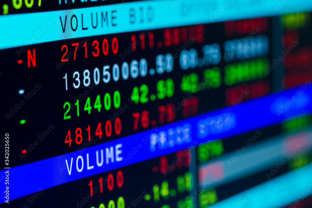 Stock exchange market business concept with selective focus effect. Display of Stock market quotes. Red and green numbers on the electronic board. Stock exchange market business concept with selective focus effect. Display of Stock market quotes. Red and green numbers on the electronic board.