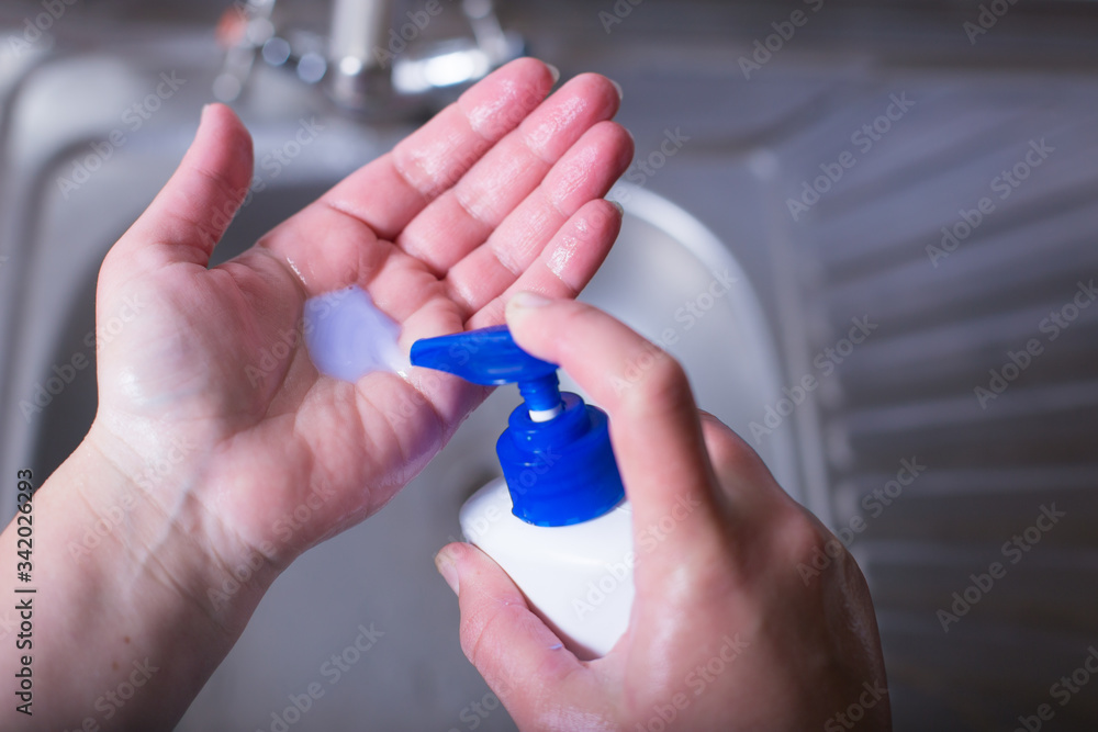 Wash hands with liquid soap - obrazy, fototapety, plakaty 
