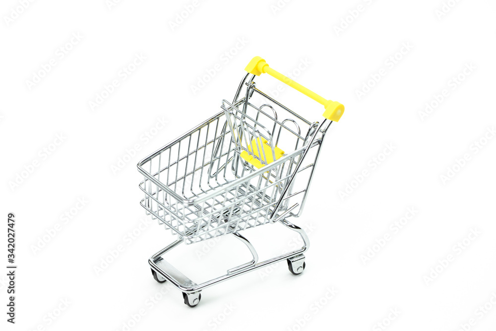 Empty supermarket trolley isolated on white background, rational consumption concept, conscious consumption trend
