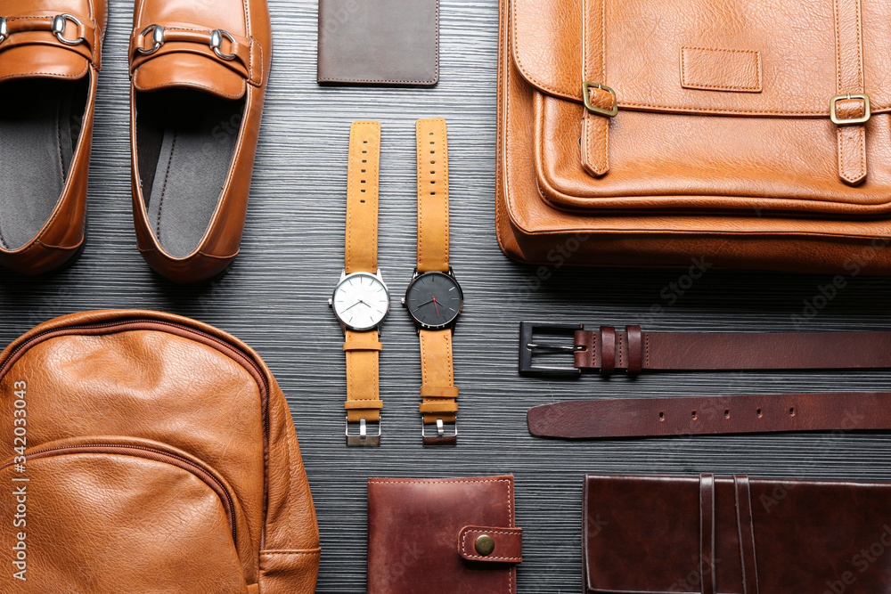 Flat lay composition with leather bags, shoes and accessories on grey  wooden table Stock-Foto | Adobe Stock