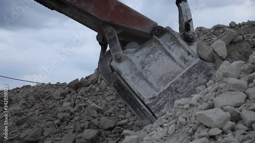 Heavy Mining Dump Truck Being Loaded With Iron Ore in pit